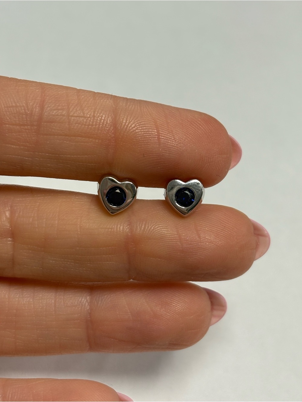 Suzy Levian Sterling Silver Heart Shaped Stud Blue CZ Earrings